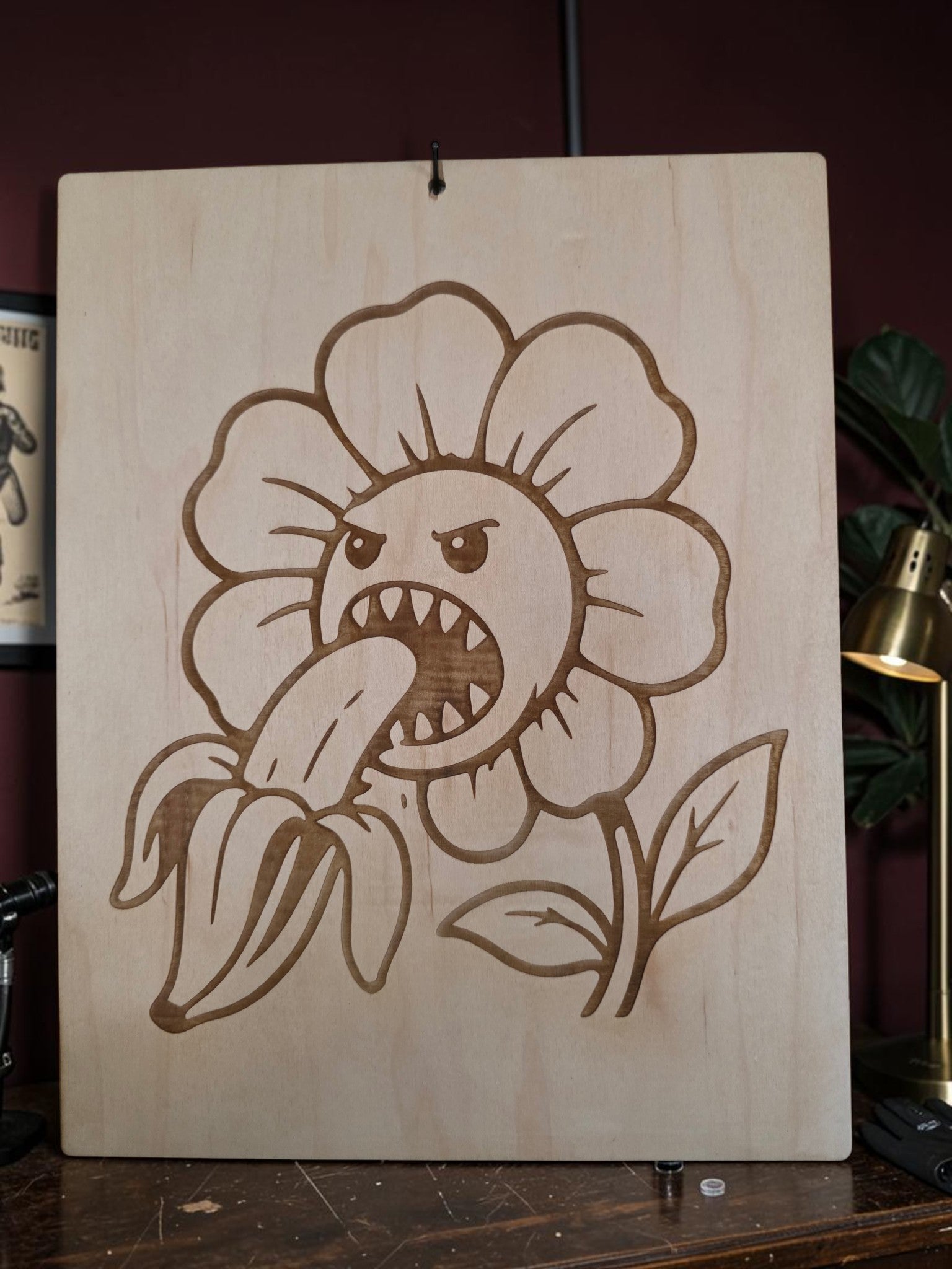 Angry Flower Eating a Banana – 11" x 17" Engraved Maple Wall Art