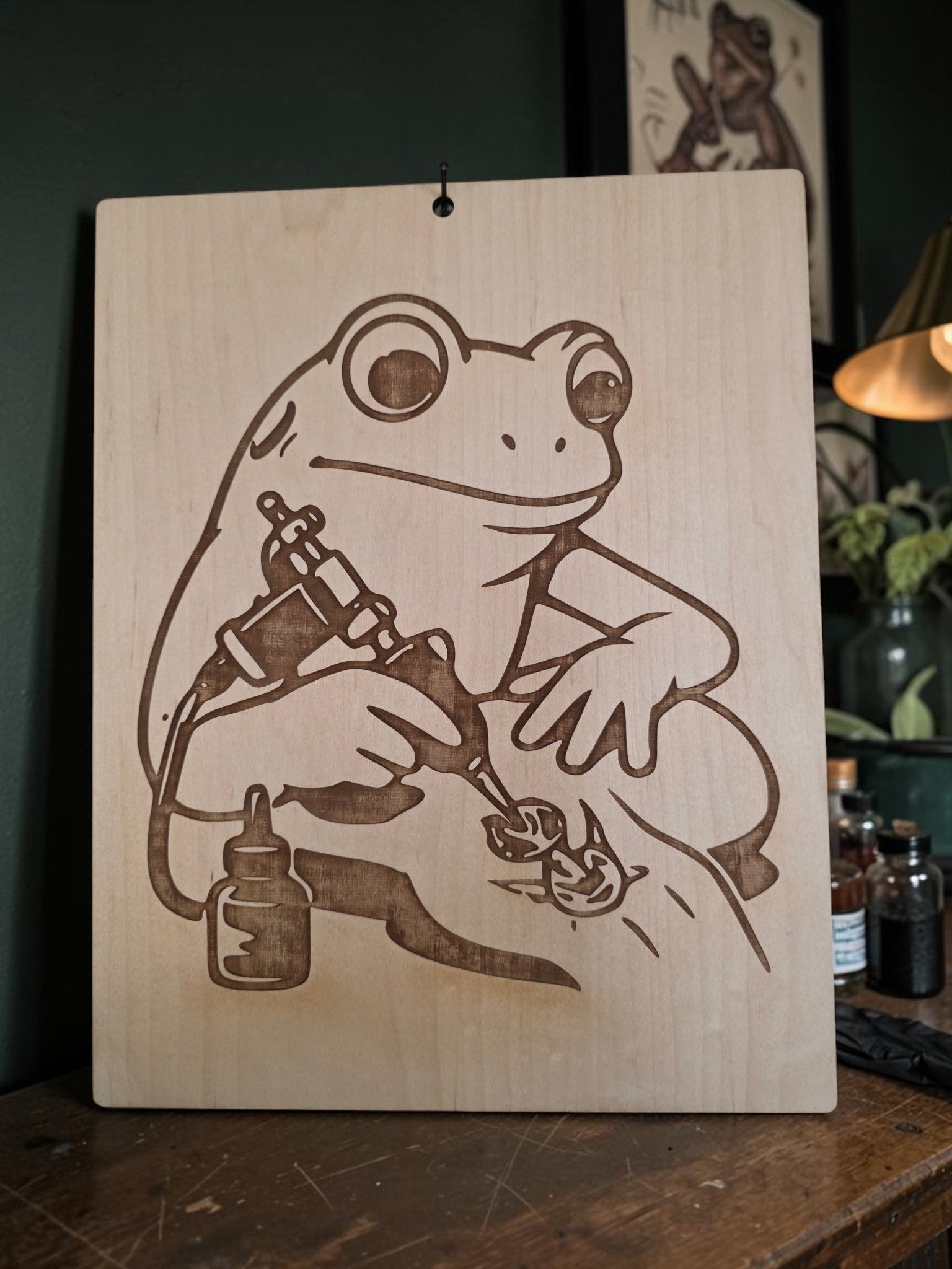 Tattoo Artist Frog – 11" x 17" Engraved Maple Wall Art