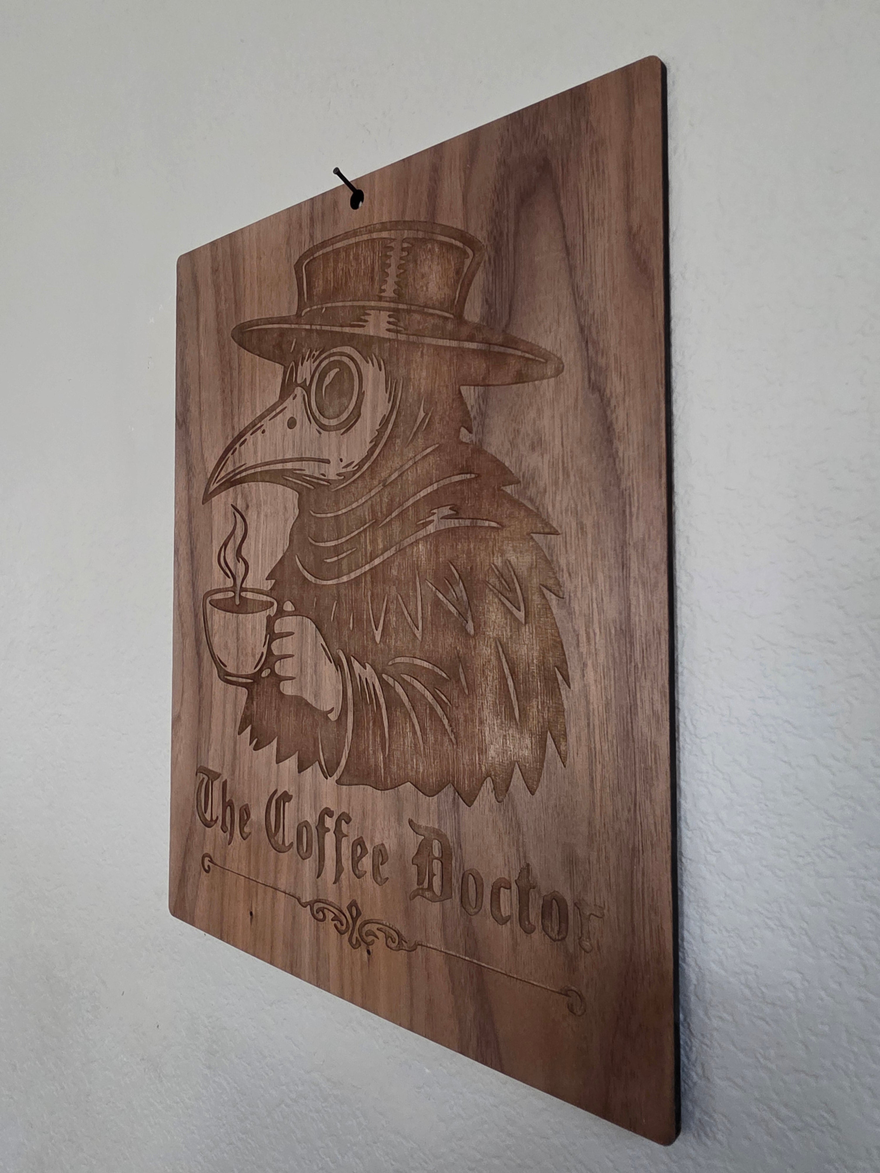 The Coffee Doctor – 11" x 17" Engraved Walnut Plague Doctor Wall Art