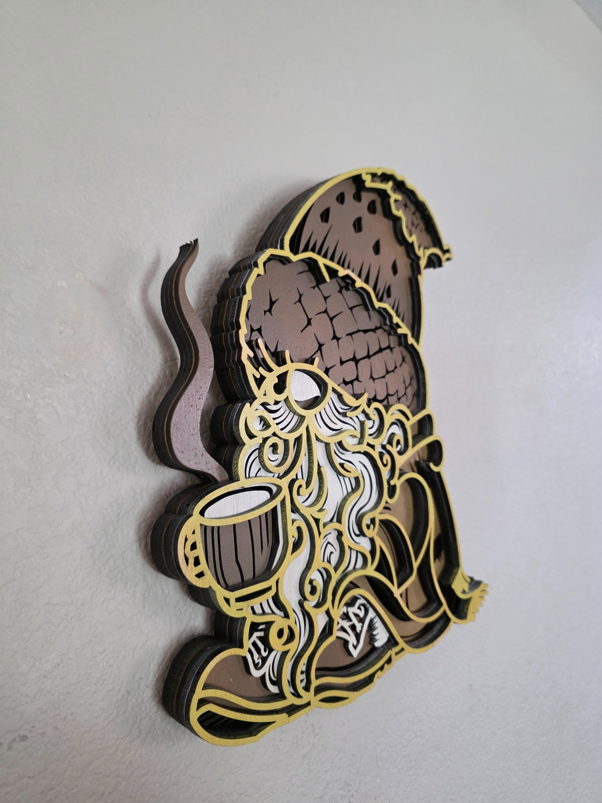 Angled side view of layered wooden fall gnome wall art showing dimensional stacked wood layers